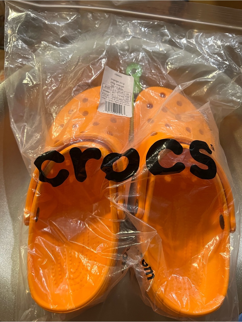 CROCS Classic Size M9/W11 in Orange Zing NWT